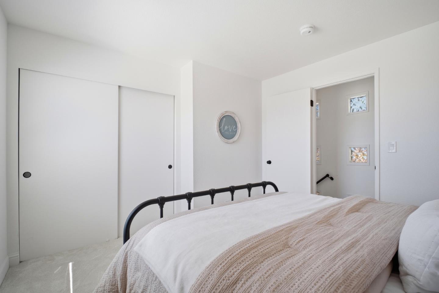 3950 Paul Terrace Fremont, CA 94538 - Photo 18 of 28 a bedroom with a bed and a large mirror