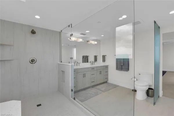 a bed room with a bed and a painting