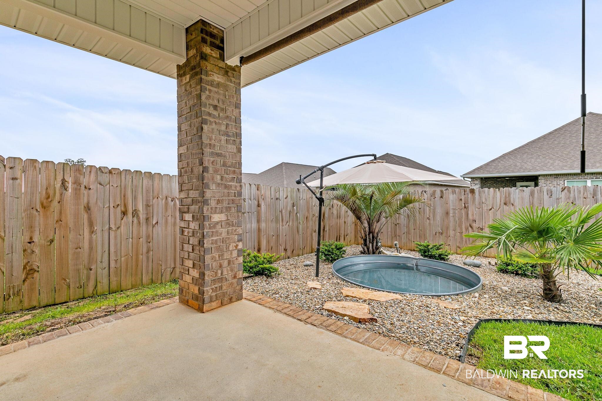 31650 Memphis Loop Daphne, AL 36527 - Photo 47 of 68 Fenced backyard featuring a patio area
