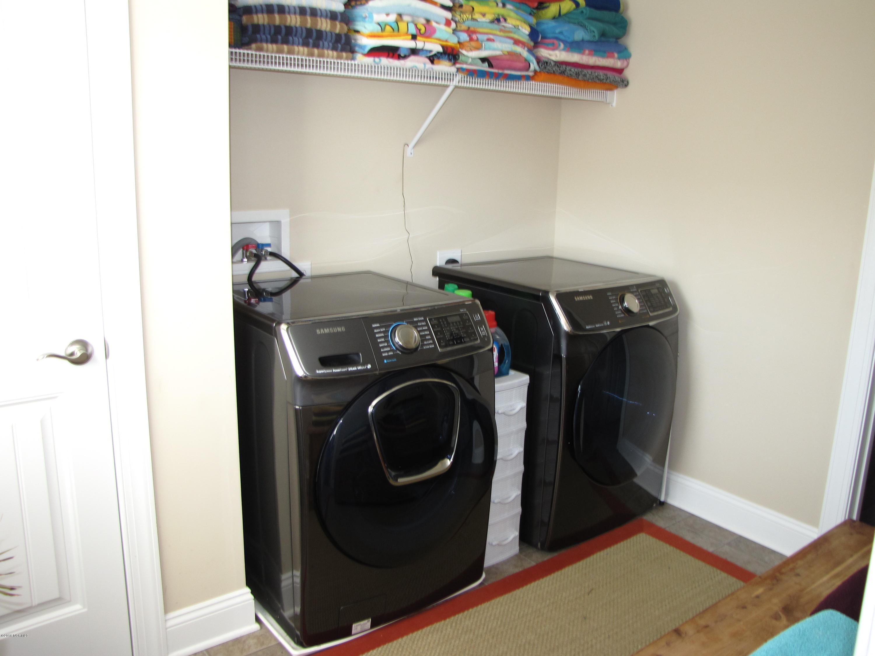 1260 South Brook Road Winnabow, NC 28479 - Photo 23 of 36 Large laundry room with 6x8 seperate storage room(not in pic)