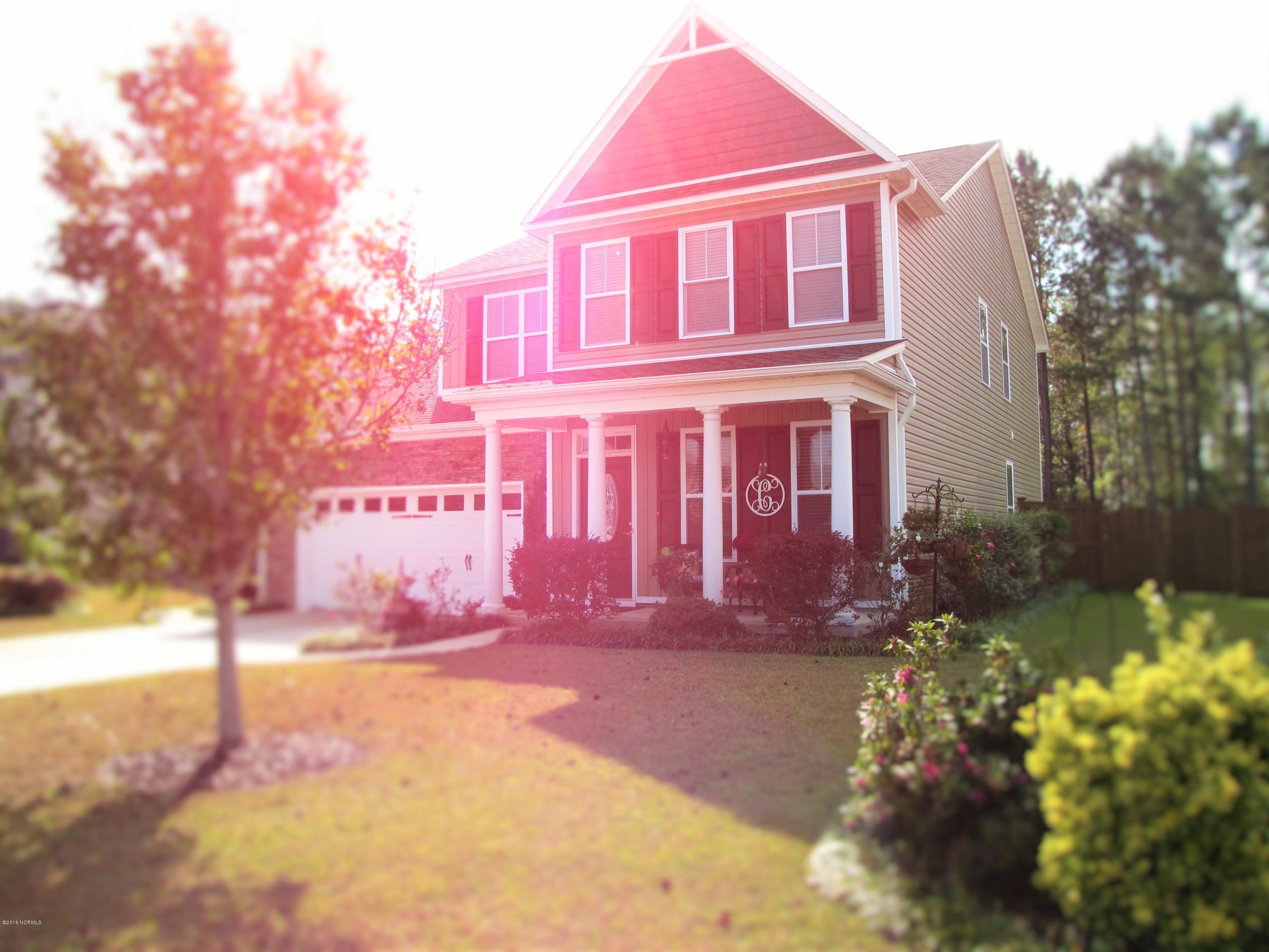 1260 South Brook Road Winnabow, NC 28479 - Photo 3 of 36 Landscaping has been thoroughly added to make it very picturesque