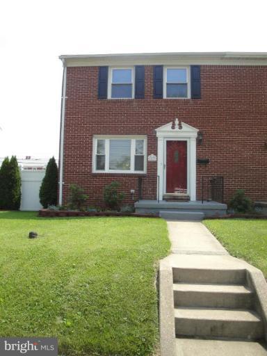 8423 Kings Ridge Road Parkville, MD 21234 - Photo 1 of 21 a front view of a house with garden
