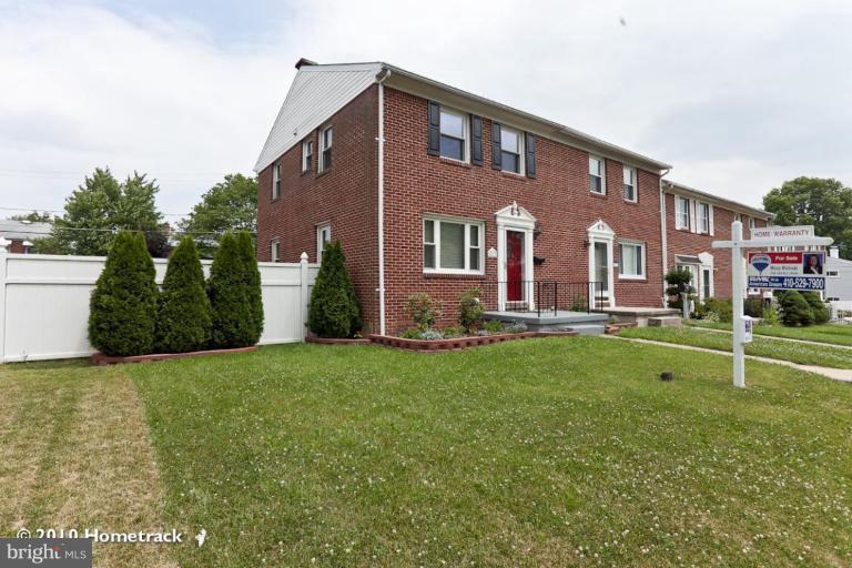 8423 Kings Ridge Road Parkville, MD 21234 - Photo 2 of 21 a house view with a garden space
