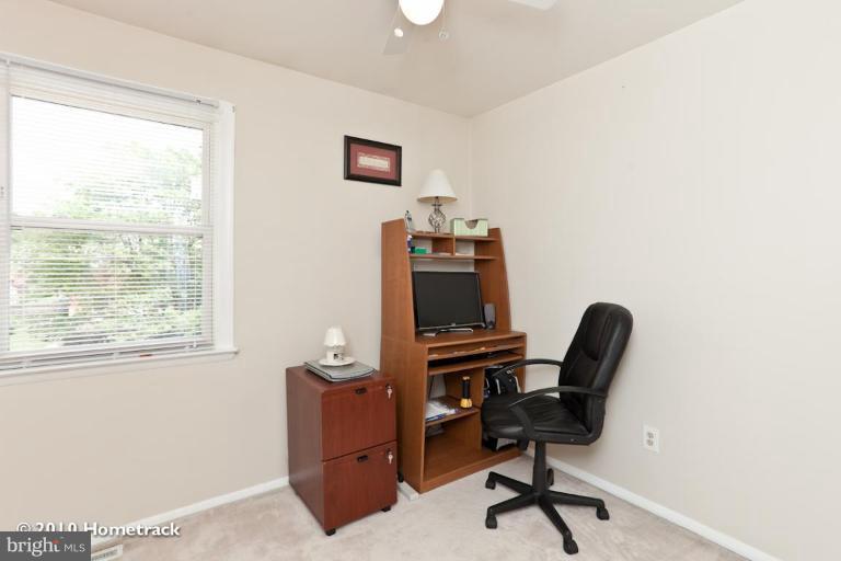 8423 Kings Ridge Road Parkville, MD 21234 - Photo 12 of 21 a view of a workspace with furniture and a window