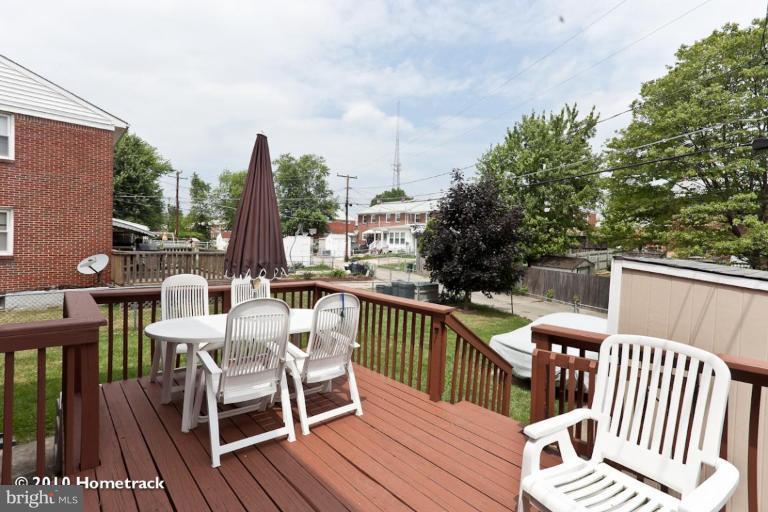 8423 Kings Ridge Road Parkville, MD 21234 - Photo 19 of 21 a view of a deck with furniture