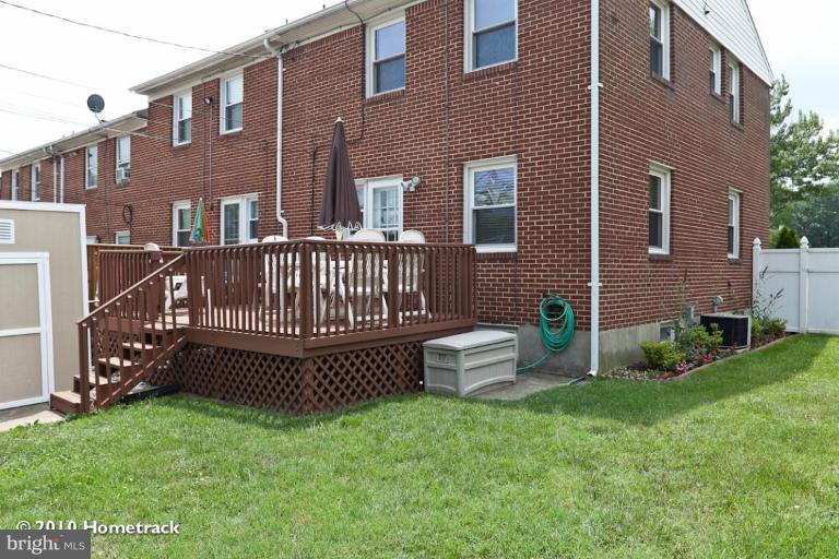 8423 Kings Ridge Road Parkville, MD 21234 - Photo 20 of 21 a view of a house with a yard