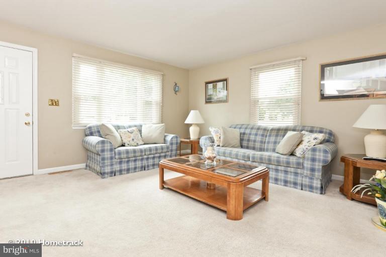 8423 Kings Ridge Road Parkville, MD 21234 - Photo 3 of 21 a living room with furniture and a large window