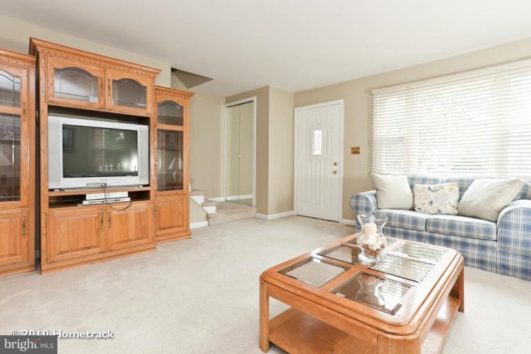 8423 Kings Ridge Road Parkville, MD 21234 - Photo 5 of 21 a living room with furniture and a flat screen tv