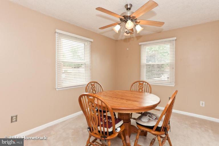 8423 Kings Ridge Road Parkville, MD 21234 - Photo 6 of 21 a dining room with furniture and window