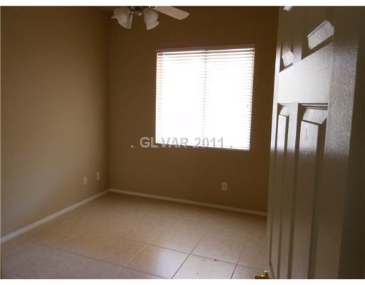 5849 Rothbury Avenue Las Vegas, NV 89141 - Photo 6 of 15 Bedroom. Downstairs bedroom with full bath