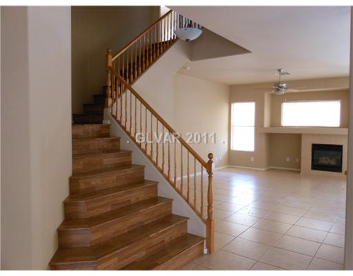 5849 Rothbury Avenue Las Vegas, NV 89141 - Photo 7 of 15 Interior Space/Layout. Wood on the stairs!