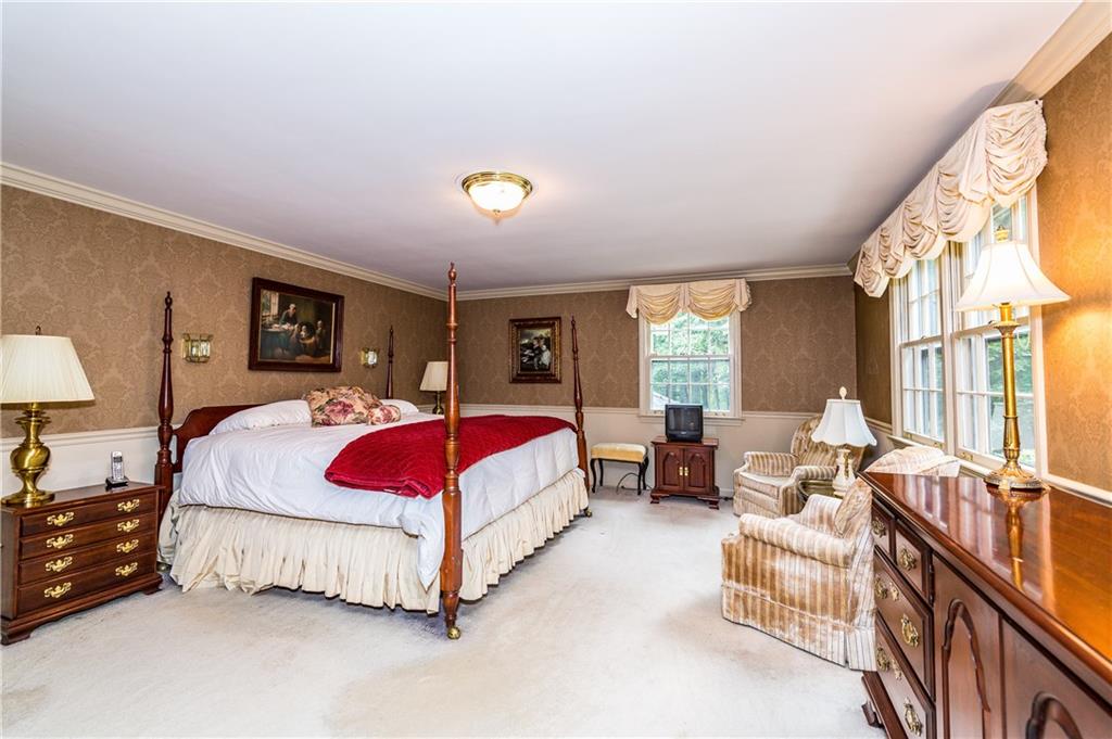 1624 Powers Run Road Pittsburgh, PA 15238 - Photo 14 of 25 MASTER BEDROOM 18X15: Hardwood floors under the carpet, crown molding and chair rail makes for a lovely master suite.