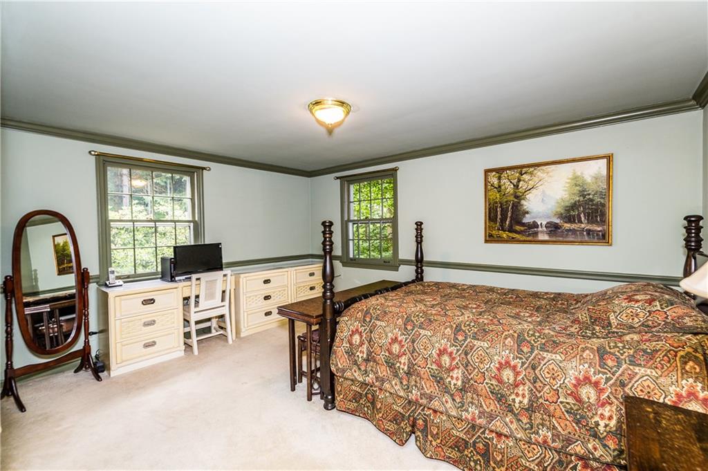 1624 Powers Run Road Pittsburgh, PA 15238 - Photo 15 of 25 2ND BEDROOM 15X15: Awesome size room with a chair rail and crown molding. Full bathroom off this room. Hard wood floors are under the carpet.