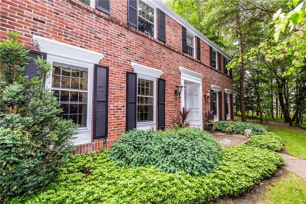 1624 Powers Run Road Pittsburgh, PA 15238 - Photo 25 of 25 FRONT OF HOUSE: Beautiful brick home and window accents compliment the front of your home. Ground cover and perennials welcome you to your front door.