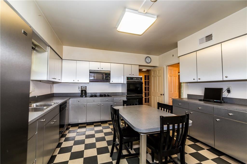 1624 Powers Run Road Pittsburgh, PA 15238 - Photo 4 of 25 KITCHEN 14X13: All stainless cabinets makes for a very retro kitchen. Must see to appreciate. Full refrigerator and separate freezer is included.