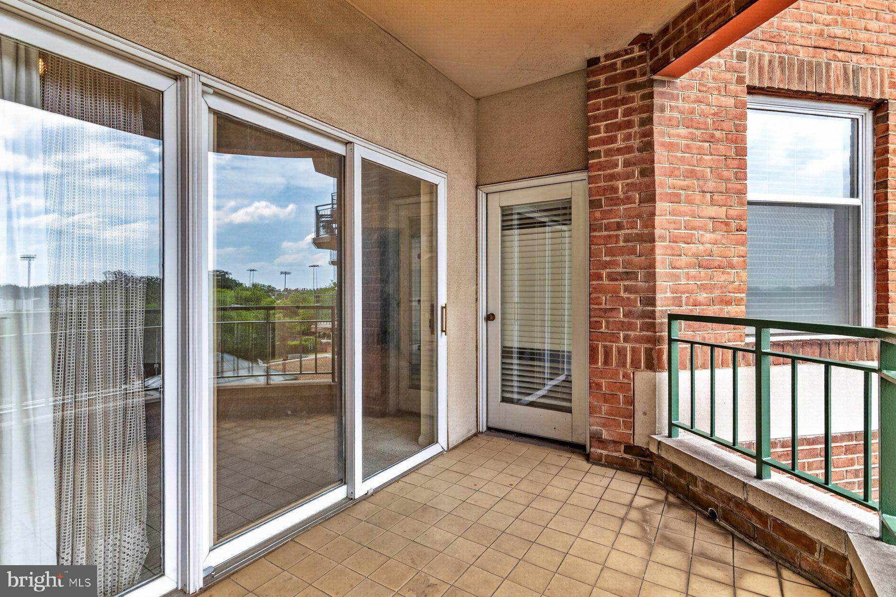 3801 Canterbury Road, Unit 403 Baltimore, MD 21218 - Photo 24 of 25 Spacious balcony with scenic views.