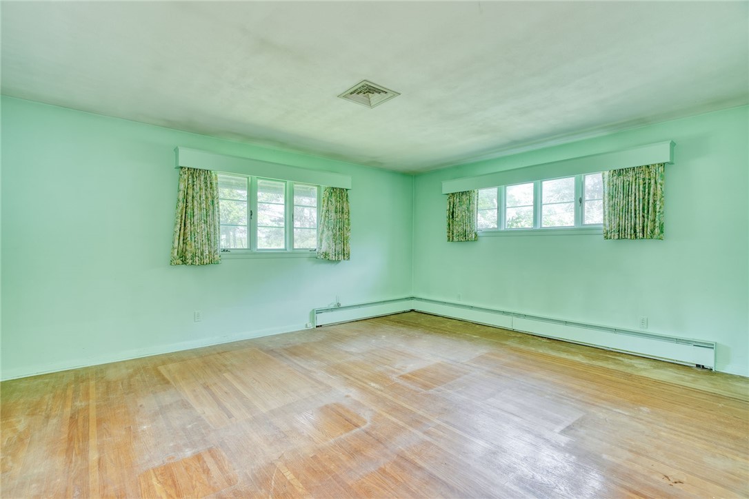 492 Drumm Road Webster, NY 14580 - Photo 26 of 48 PRIMARY/MASTER BEDROOM W/HARDWOODS