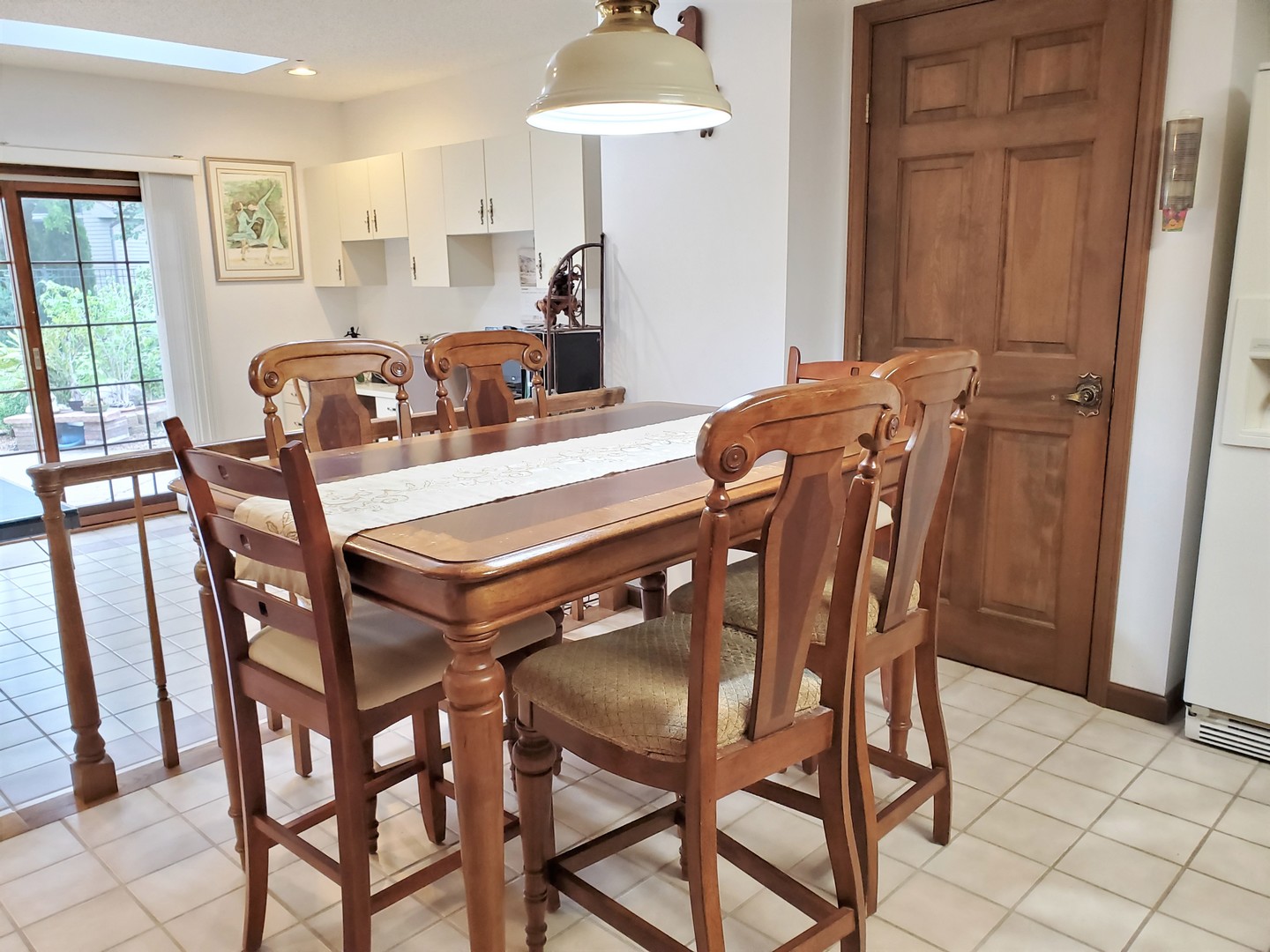 1013 Galen Drive Champaign, IL 61821 - Photo 19 of 68 a view of a dining room with furniture and chandelier