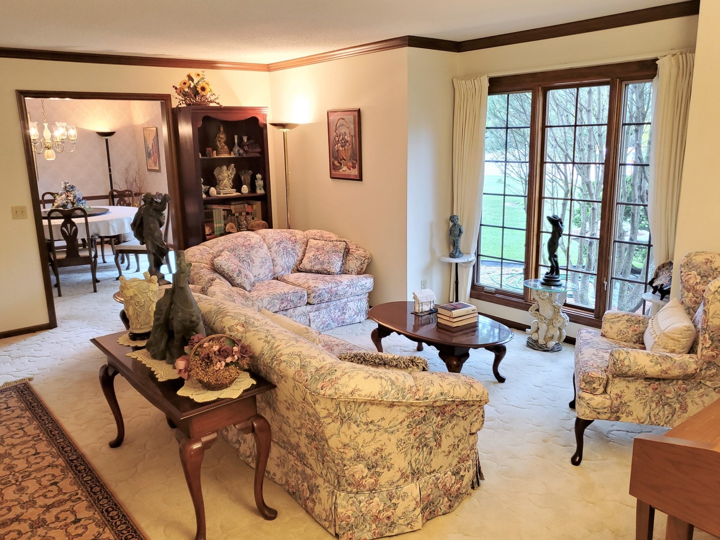 1013 Galen Drive Champaign, IL 61821 - Photo 22 of 68 a living room with furniture and floor to ceiling windows