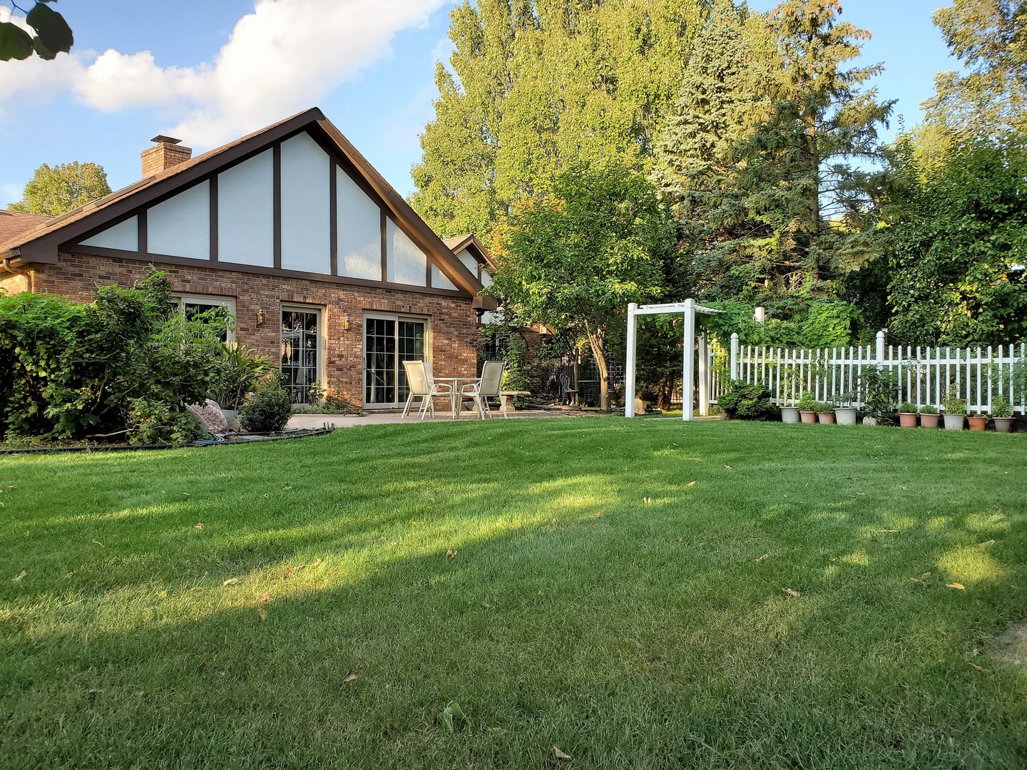 1013 Galen Drive Champaign, IL 61821 - Photo 32 of 68 a front view of a house with garden