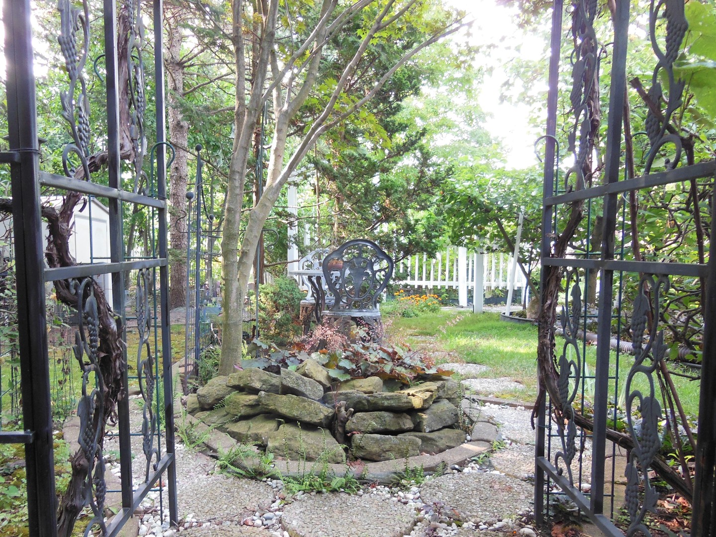 1013 Galen Drive Champaign, IL 61821 - Photo 33 of 68 a view of a garden with a large trees