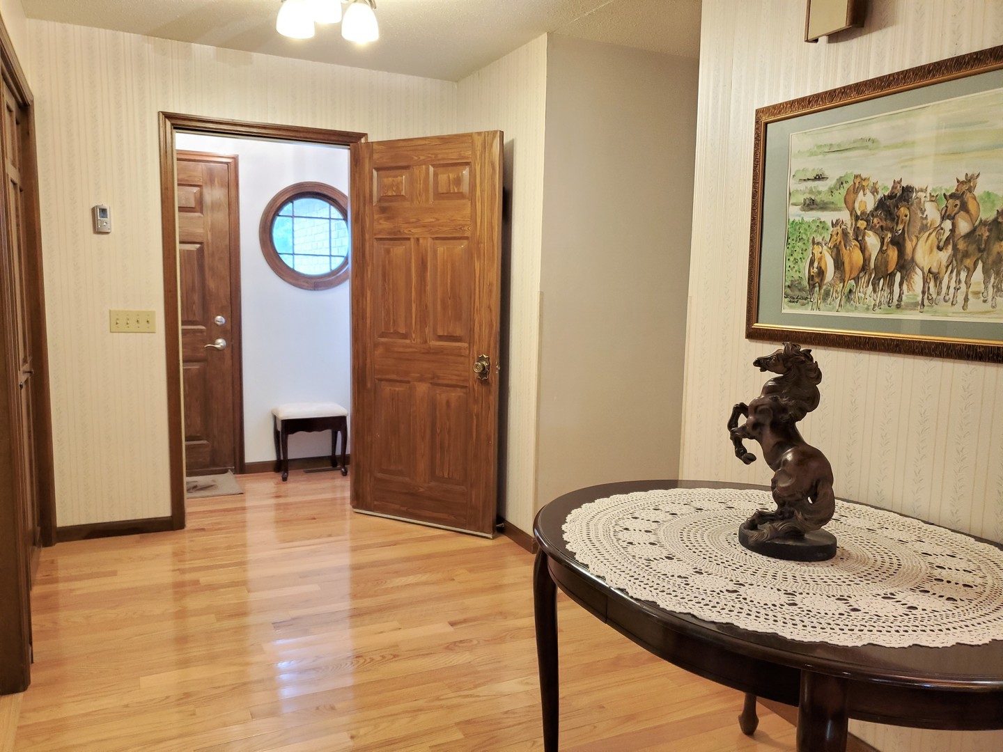 1013 Galen Drive Champaign, IL 61821 - Photo 10 of 68 a view of a livingroom with furniture and mirror