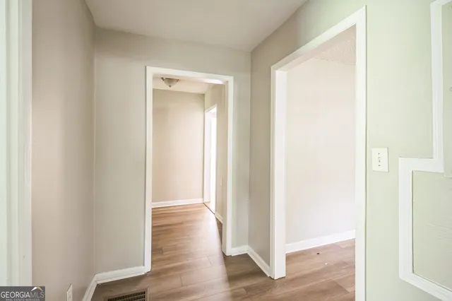 an empty room with windows