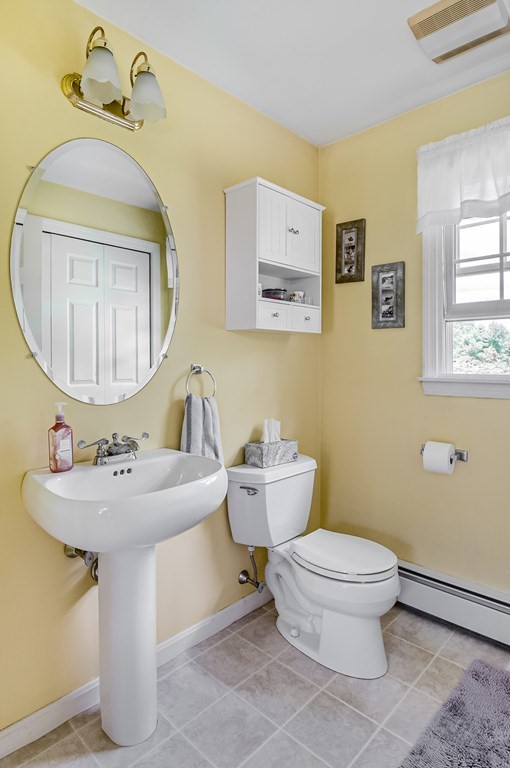 8 10 Rod Road Rutland, MA 01543 - Photo 13 of 32 a bathroom with a toilet sink and mirror