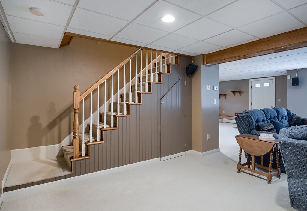 8 10 Rod Road Rutland, MA 01543 - Photo 25 of 32 a view of a livingroom with furniture and stairs