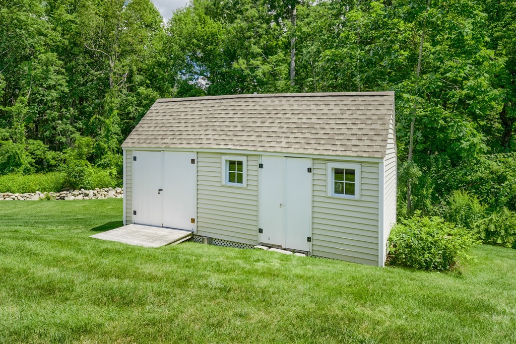 8 10 Rod Road Rutland, MA 01543 - Photo 31 of 32 a view of a house with a yard