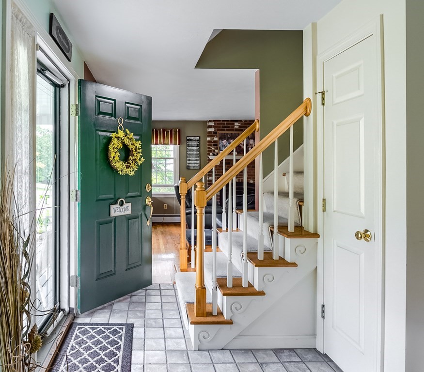 8 10 Rod Road Rutland, MA 01543 - Photo 4 of 32 a view of entryway and hall with wooden floor