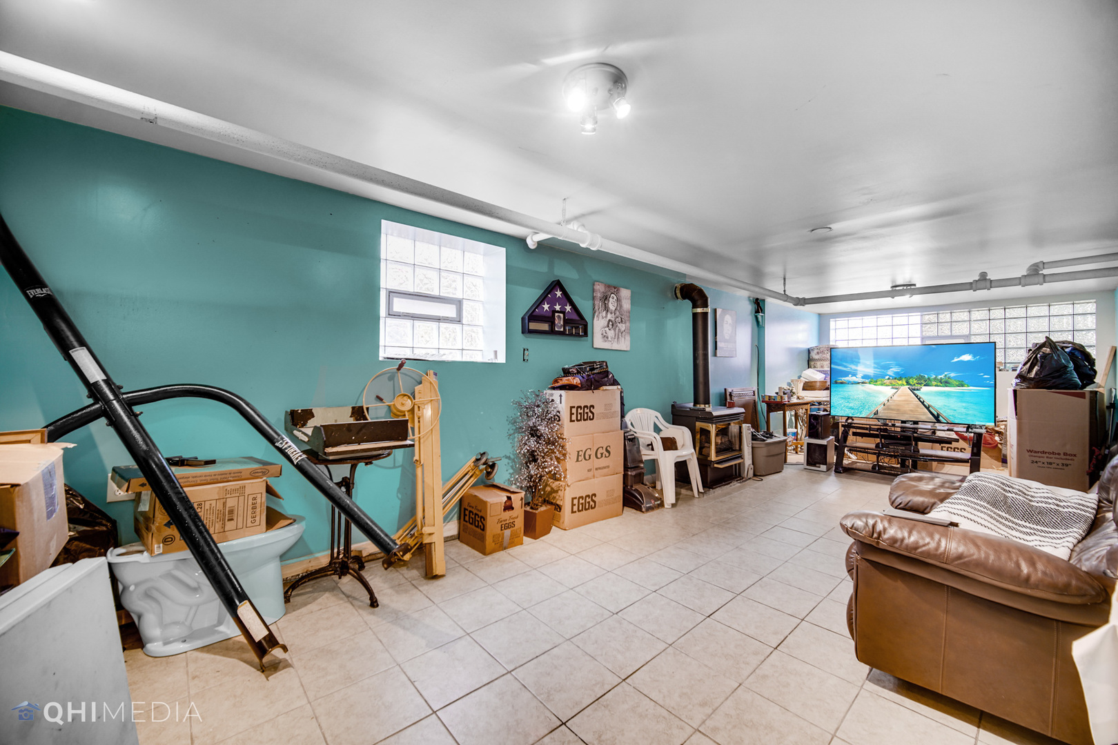 8417 South Manistee Avenue Chicago, IL 60617 - Photo 18 of 25 a view of a room with gym equipment
