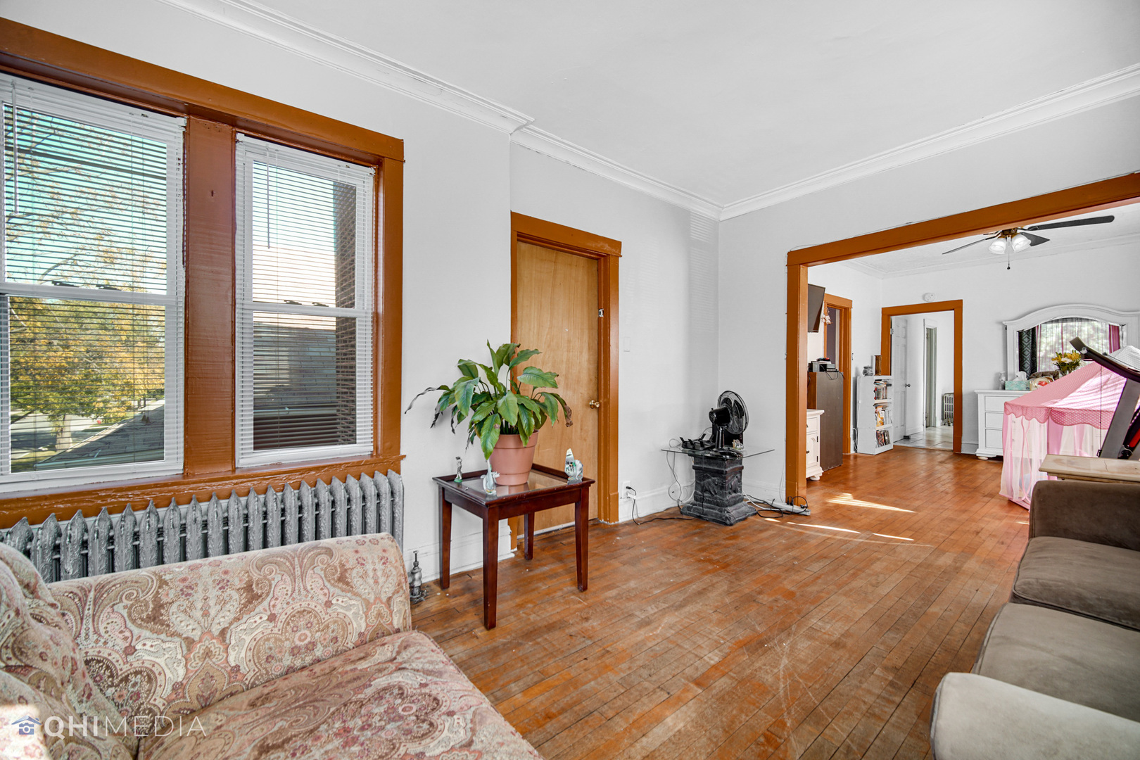 8417 South Manistee Avenue Chicago, IL 60617 - Photo 19 of 25 a bedroom with furniture and a window