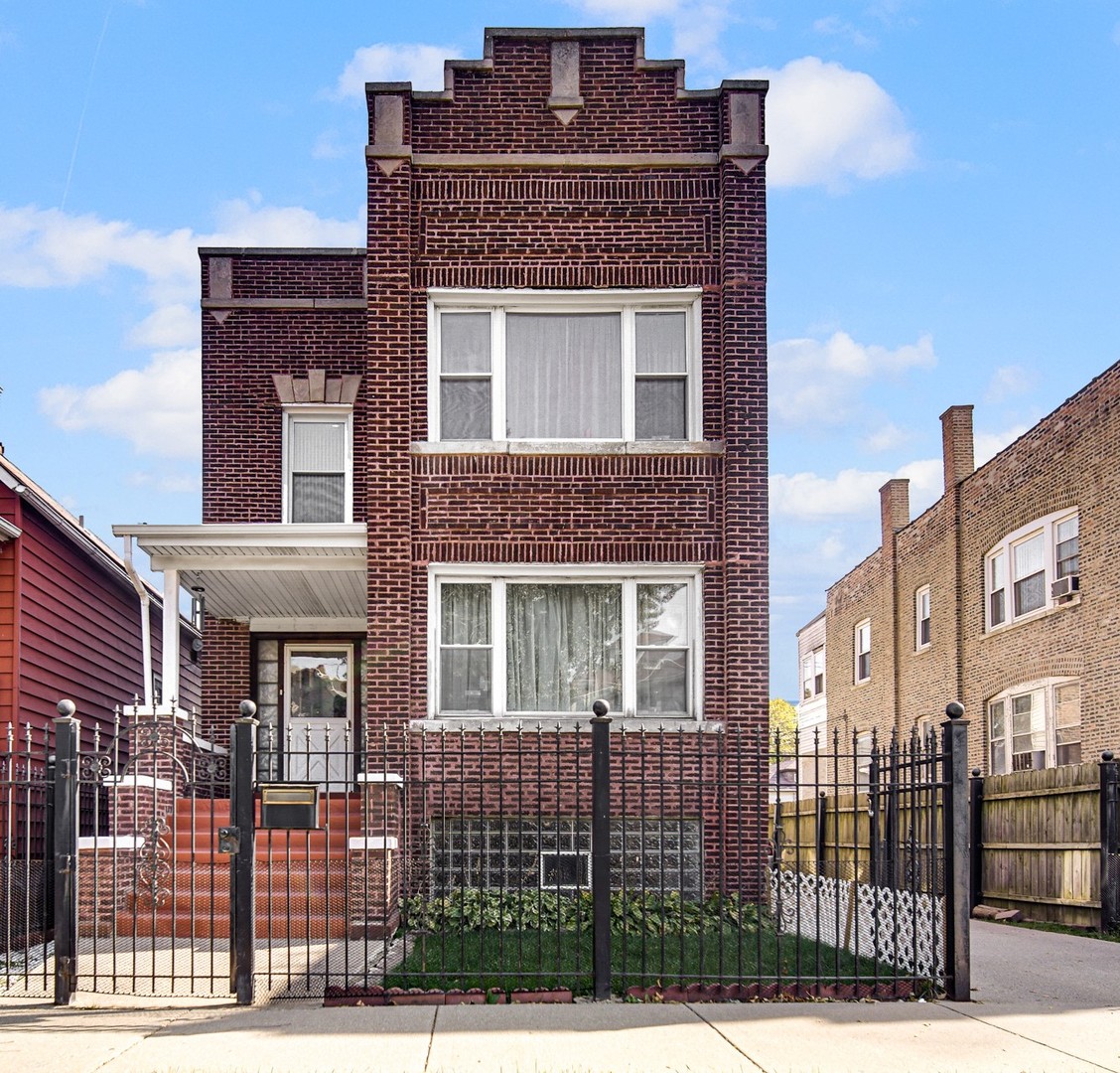 8417 South Manistee Avenue Chicago, IL 60617 - Photo 2 of 25 a front view of a house