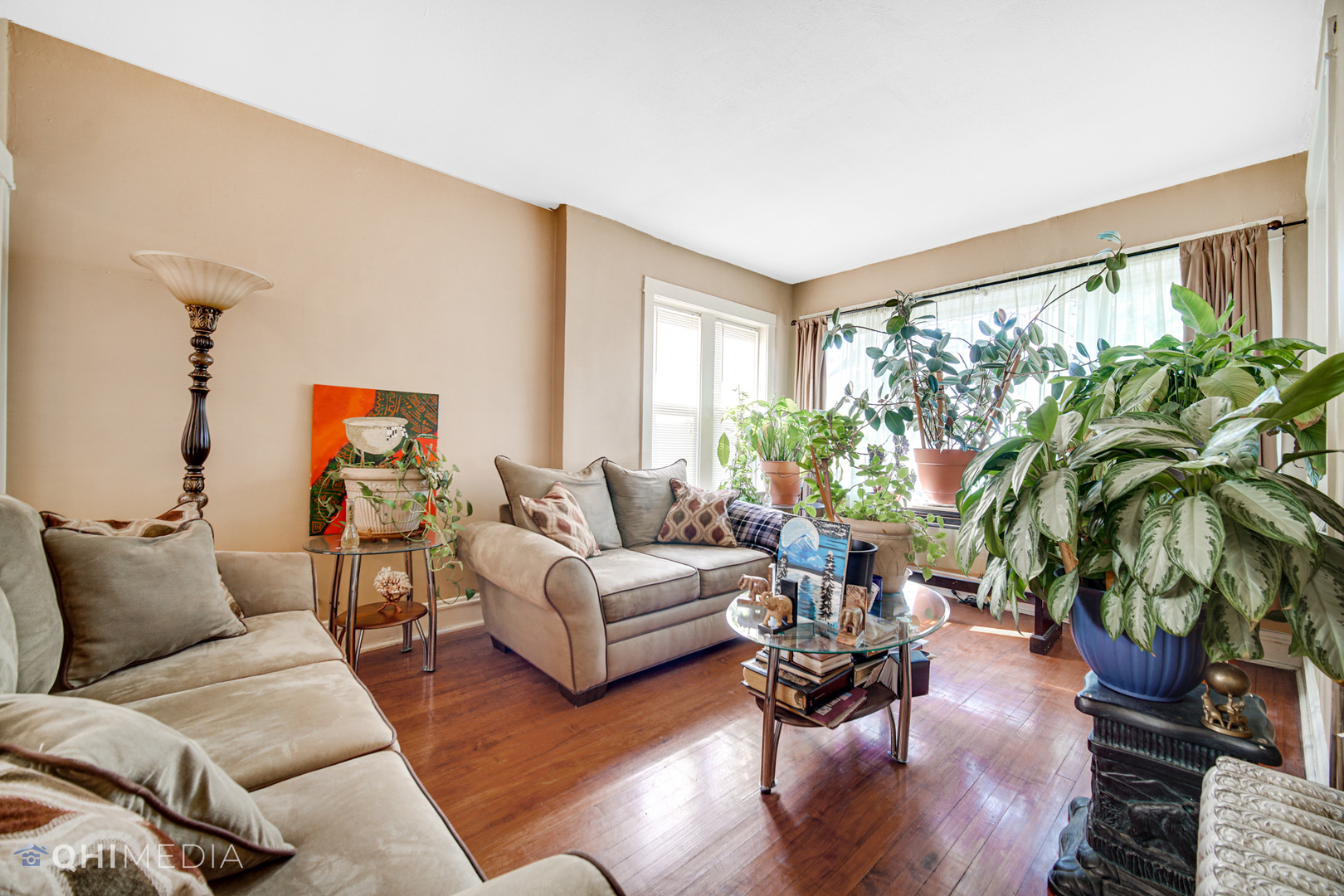 8417 South Manistee Avenue Chicago, IL 60617 - Photo 4 of 25 a living room with furniture and a large window