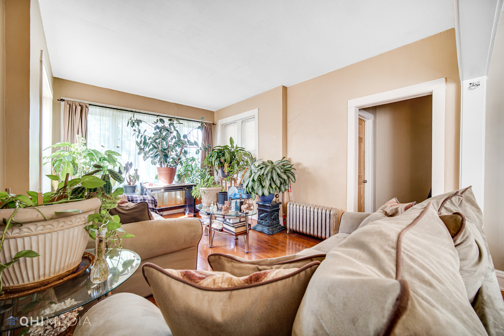 8417 South Manistee Avenue Chicago, IL 60617 - Photo 5 of 25 a living room with furniture and a large window