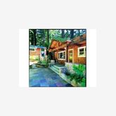 a picture of a bench in front of a building