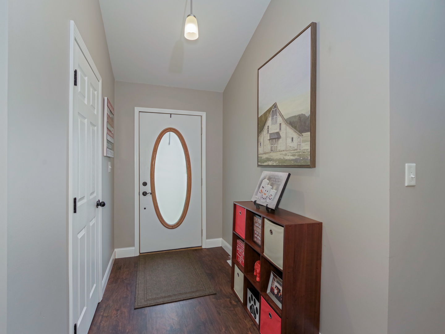319 West Cermak Road Braidwood, IL 60408 - Photo 3 of 32 a view of a hallway with wooden floor and entryway