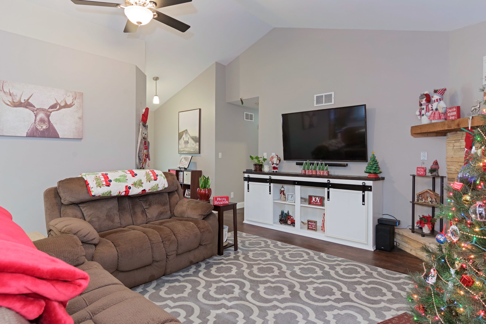 319 West Cermak Road Braidwood, IL 60408 - Photo 7 of 32 a living room with furniture and a flat screen tv