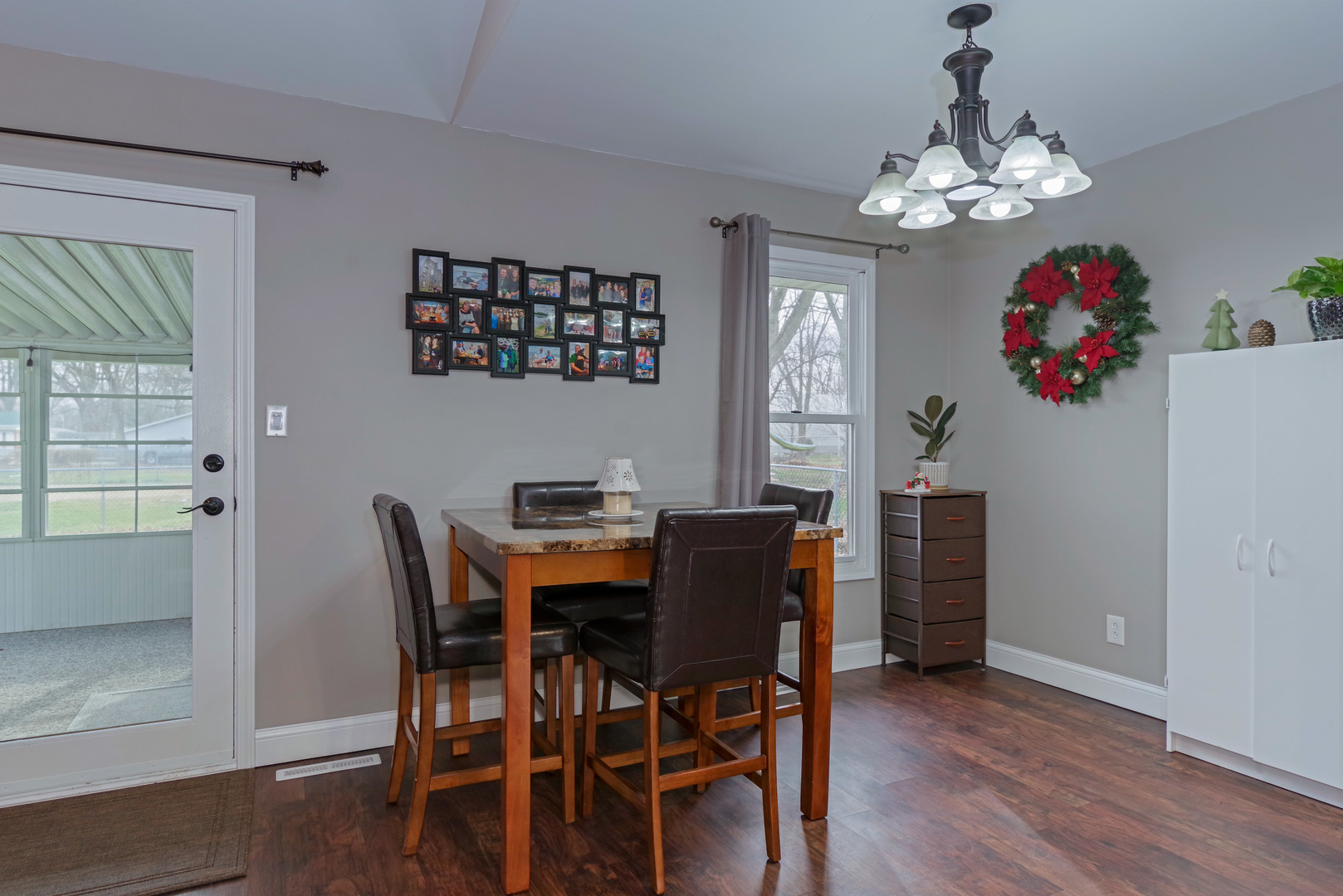 319 West Cermak Road Braidwood, IL 60408 - Photo 9 of 32 a view of a dining room with furniture and chandelier