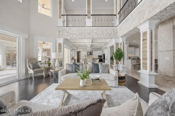 a kitchen with stainless steel appliances granite countertop a sink and stove