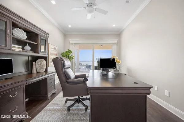 a view of a lake with a car parked