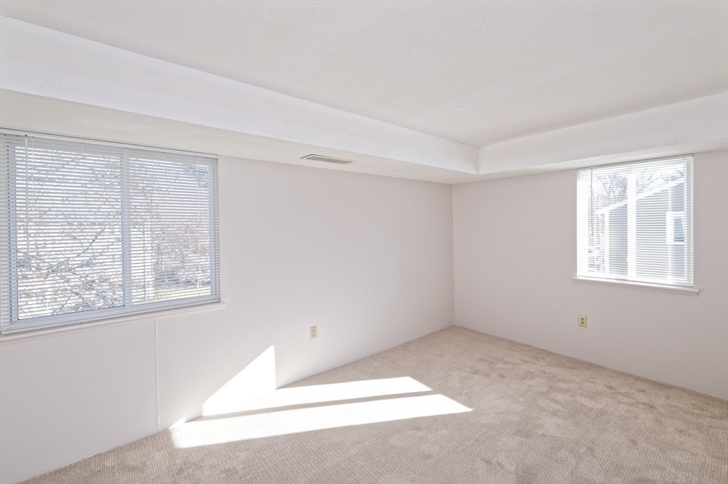 3 Post Oak Lane, Unit 9 Natick, MA 01760 - Photo 16 of 30 an empty room with a window
