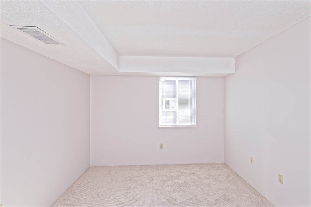3 Post Oak Lane, Unit 9 Natick, MA 01760 - Photo 19 of 30 an empty room with a window