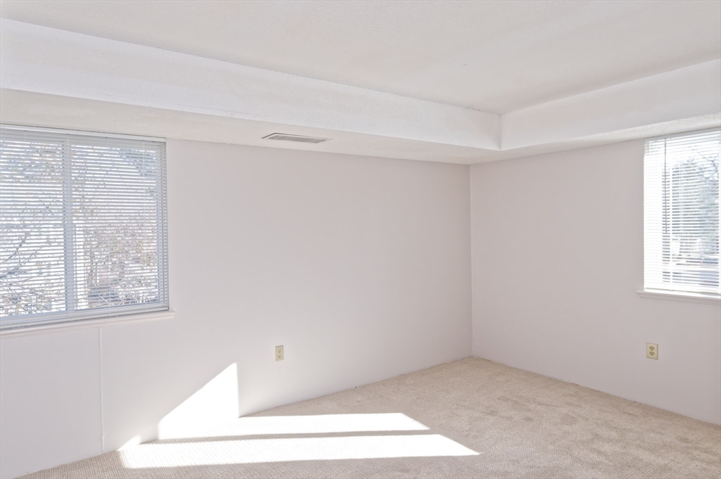 3 Post Oak Lane, Unit 9 Natick, MA 01760 - Photo 20 of 30 an empty room with a window