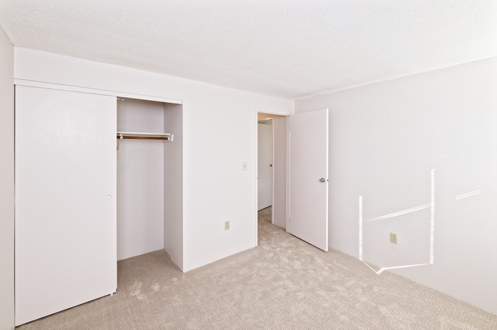 3 Post Oak Lane, Unit 9 Natick, MA 01760 - Photo 21 of 30 a view of an empty room