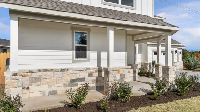 a kitchen with a sink cabinets and window