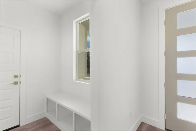 a bathroom with a bathtub and shower