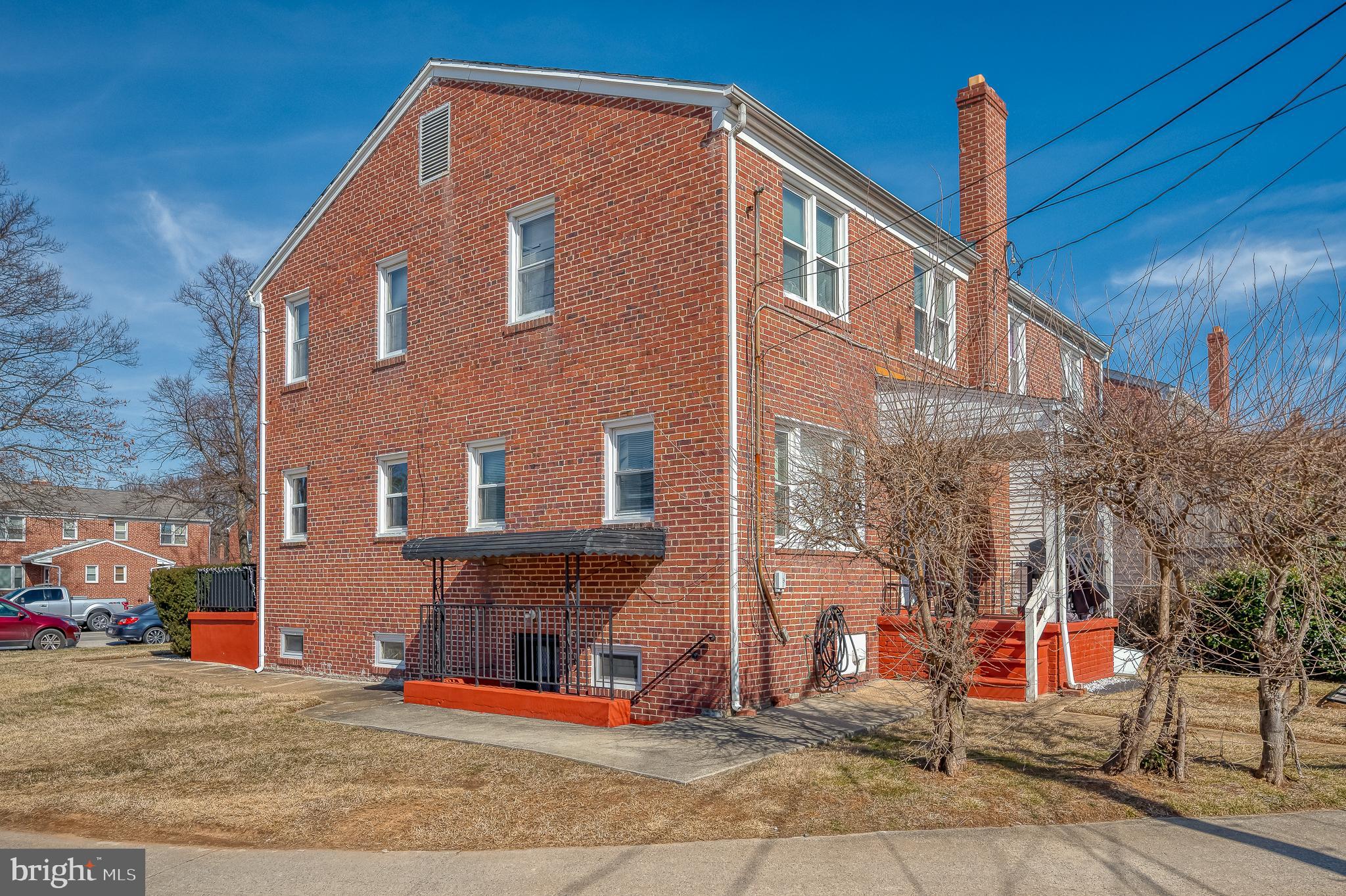 4023 Fallstaff Road Baltimore, MD 21215 - Photo 20 of 22 a front view of a house with basket ball court