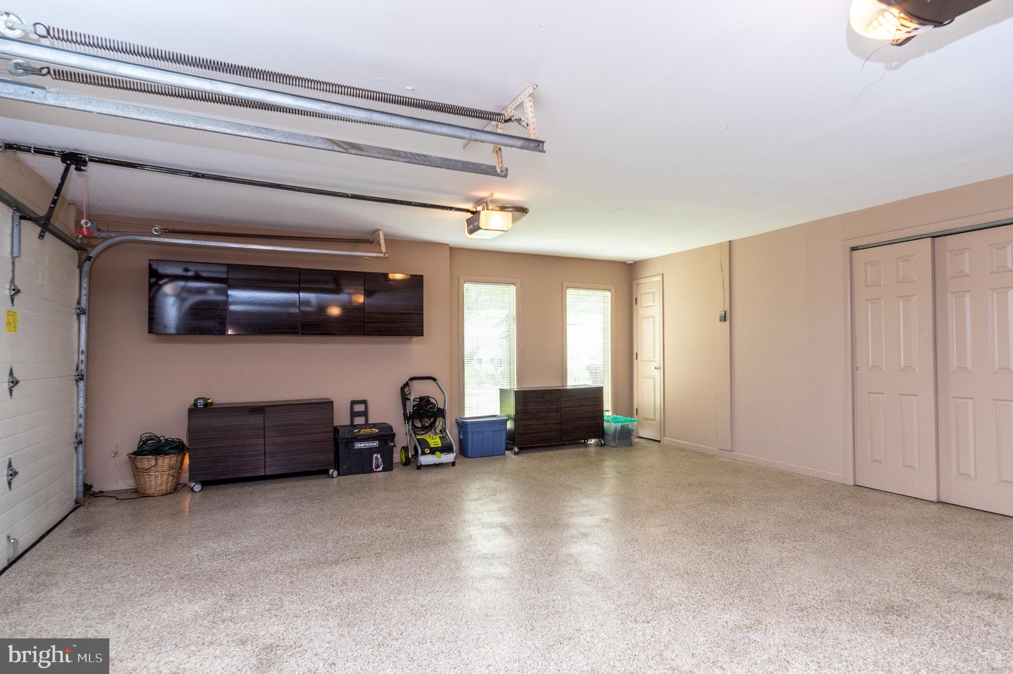 1004 Stonebridge Road Lower Gwynedd, PA 19002 - Photo 54 of 105 Expoxy Floor and High End Cabinets in Garage!